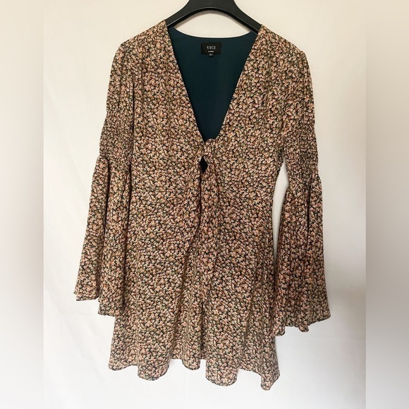 Vici Dresses & Skirts - Vici size:L floral sun dress with low V neckline, tie front, and Flounce sleeves